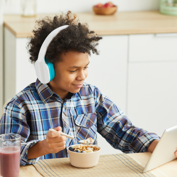 home educated student studying GCSE subjects at home with books and resources UK