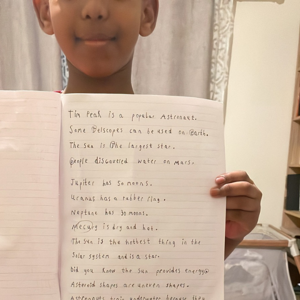 home educating child completing project based learning activity at home UK
